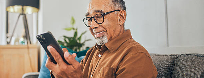 A person on their phone at home